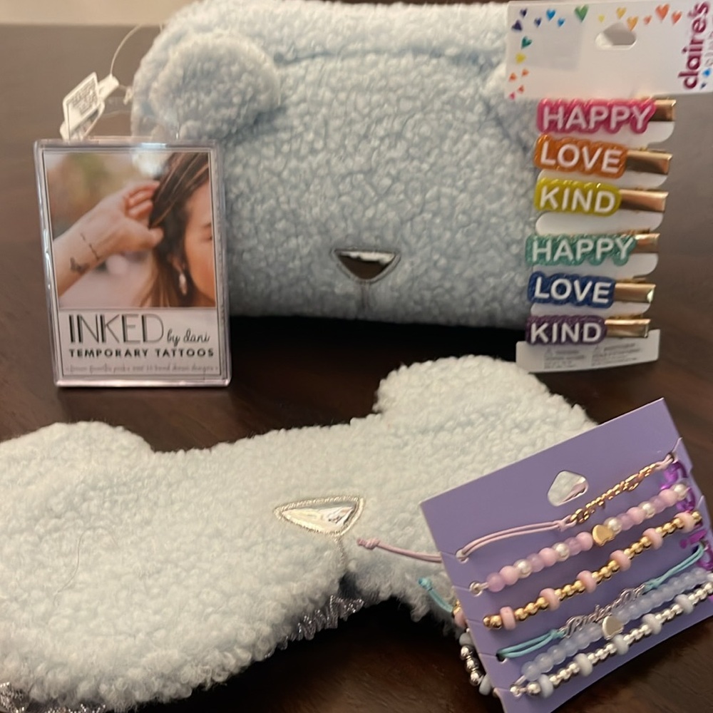 Claire’s Kids Fuzzy Makeup Bag, Blue Bear eye Mask, pins, bracele & tattoos